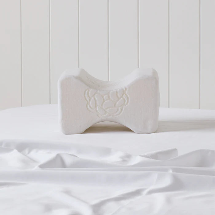 memory-foam-pillow-knee-wedge-on-bed_4a755830-f0ce-4d0a-a8f5